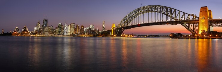 Naklejka na ściany i meble panorama of sydney harbour on an autumn night from kirribilli on the northern shore of sydney harbour in nsw, australia