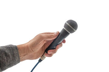 mans hand holding microphone