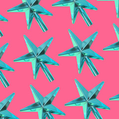 Pattern of Christmas tree toys in the shape of a golden stars for the top of the tree on pink background. Xmas and New Year celebrating party.