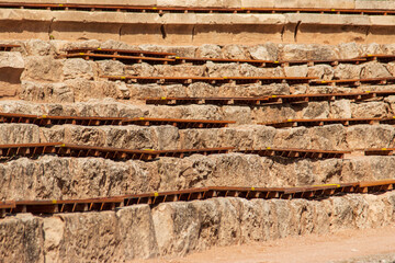 old stones form a wall as a background