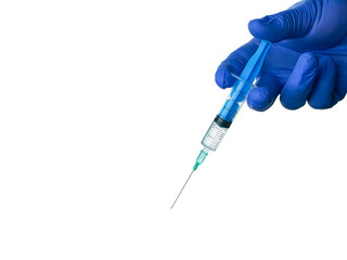 Medical disposable plastic syringe in hand on a white background, copy space. A hand in a blue glove holds a syringe, close-up, isolated. The concept of epidemic and pandemic prevention, vaccination.