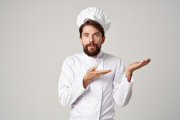 male cook restaurant service Professional hand gesture light background