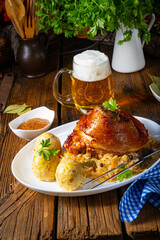 pork knuckle with sauerkraut and sweet mustard