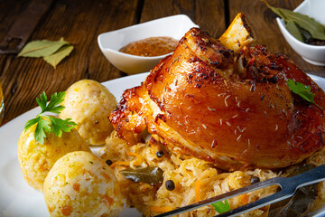 pork knuckle with sauerkraut and sweet mustard