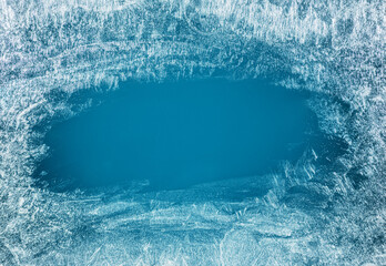 Frost patterns on frozen winter window as a symbol of Christmas wonder. Christmas or New year background. - 470587512