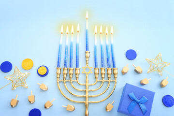 Religion image of jewish holiday Hanukkah background with menorah (traditional candelabra),...