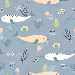 Narwhale, jellyfish and rainbow seamless childish pattern on blue grey background. Hand drawn repeat pattern for wrapping, fabrik, textile or paper projects. Vector illustration.