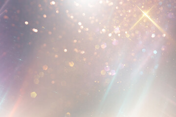 background of abstract gold and silver glitter lights. defocused