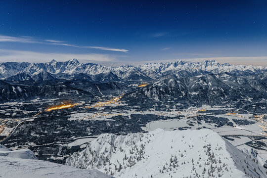 Fire amidst snowcapped mountains at Villach, Carinthia, Austria