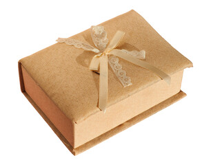 A golden-colored gift box made of textured fabric with a ribbon bow, isolated on a white background