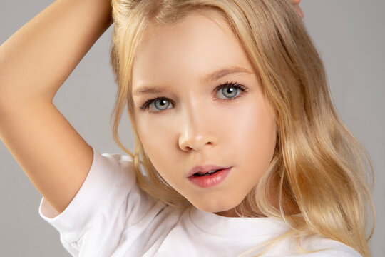 Close-up beauty face of little girl, pretty kid portrait