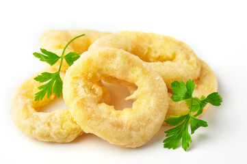 Raw calamari rings over white background