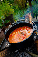 Kettle goulash is prepared over an open fire!
