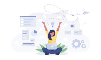 Woman with laptop sitting in nature and leaves.