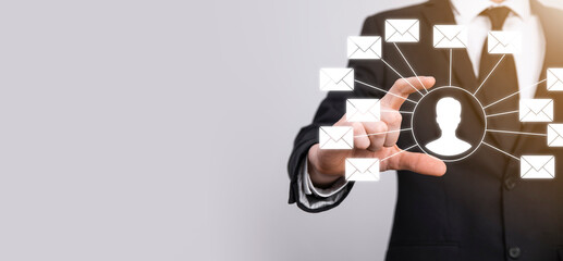 Male hand holding letter icon,email icons .Contact us by newsletter email and protect your personal information from spam mail. Customer service call center contact us.Email marketing and newsletter