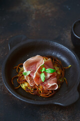 Hash brown potato with prosciutto and basil. Potato Pancakes. delicious Vegetable fritters. Potato...
