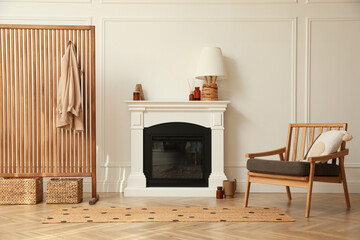 Stylish room with folding screen and fireplace. Interior design