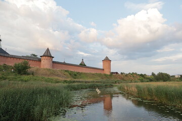 Fototapeta premium castle on the river (Suzdal town monastery)