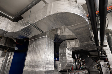 Ventilation rectangular pipes. Infrastructure in a residential building.