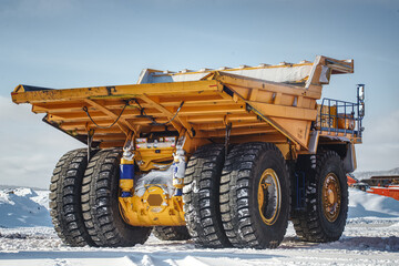 Big yellow mining truck at worksite