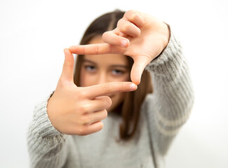 Girl pointing something, finger on focus