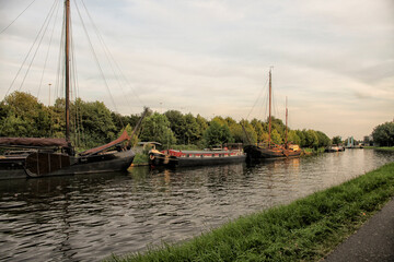Old sailing boats in a canal in the Netherlands © Patricia