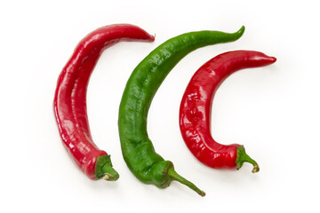 Red and green peppers chili on a white background