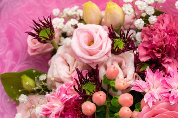 A pink bouquet of flowers for a gift or event background. close-up