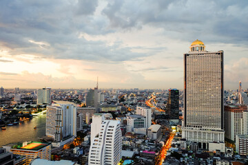 City scape in Bangkok, Taksin Bridge Area and Chao Phraya River at night day