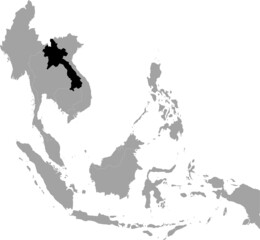 Black Map of Laos inside the gray map of Southeast region of Asia