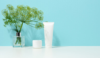 empty white plastic tube and jar for cosmetics. Packaging for cream, gel, serum, advertising and product promotion, mock up