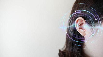 Ear of young woman with sound waves simulation technology. Concept of hearing test, hearing aids,...