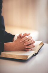 focus on woman's hand While praying for Christianity with blurry body background, casual woman prays with her hands with scriptures. - obrazy, fototapety, plakaty