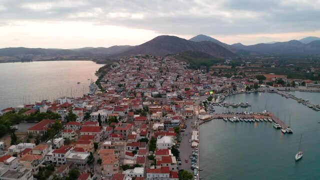Aerial view of Ermioni town at sunset, Greece. Bay in the city at dusk.