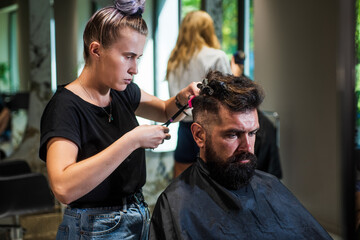 Final touch. perfect haircut with blade razor. barber master cut hair. mature hipster with beard at hairdresser. brutal hipster with moustache making new hairstyle. barbershop. male trendy hairdo