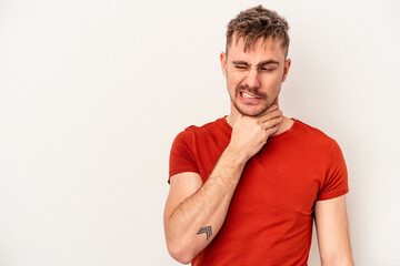 Obraz premium Young caucasian man isolated on white background showing thumb down and expressing dislike.