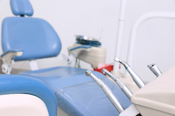 Fototapeta premium Set of professional equipment in dentist's office, space for text