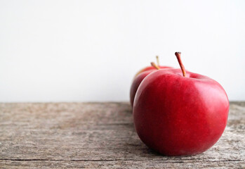 red apple on wooden background