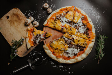 pizza with ground beef and cheese
