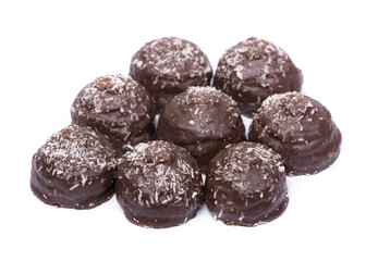 Group of chocolate glazed cakes with coconut chips