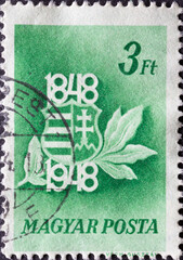 HUNGARY - CIRCA 1948: A post stamp printed in Hungary showing the National Coat of Arms of Hungary....