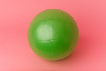 Pilates ball isolated on pink background