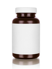 Medicine bottle of brown glass or plastic isolated on white