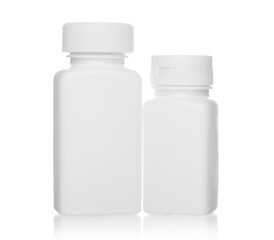 White medical bottles, isolated on white background