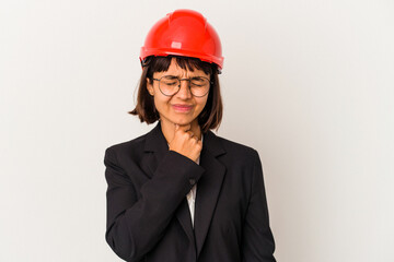 Young architect woman with red helmet isolated on white background suffers pain in throat due a virus or infection.