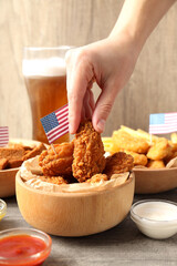 Concept of Super bowl snacks on gray wooden table