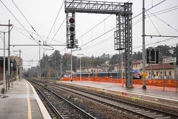 Fototapeta premium Traffic lights and power poles at the station