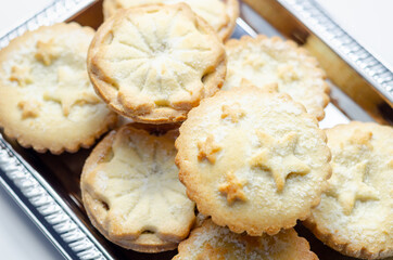 All-butter pastry pies with a mincemeat filling with spiced vine fruits, Christmas cookies