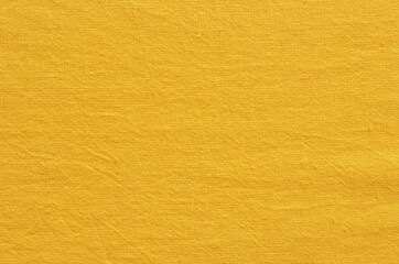 Yellow cotton fabric texture background, seamless pattern of natural textile.