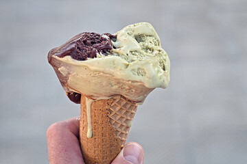 ice cream, cone that runs pistachio and chocolate